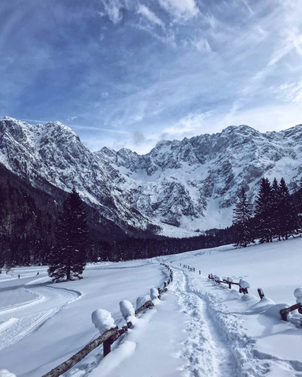 Jezersko in Slovenia covered in snow on a clear winter's day