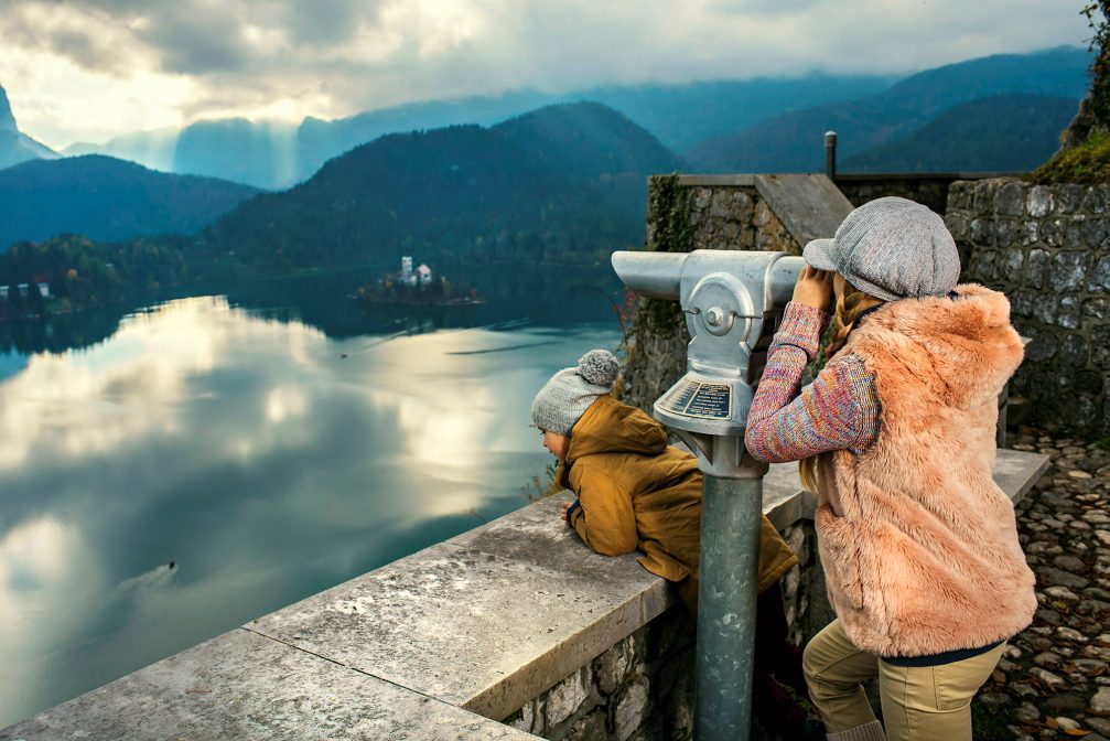 A tourist watching Lake Bled from Bled Castle