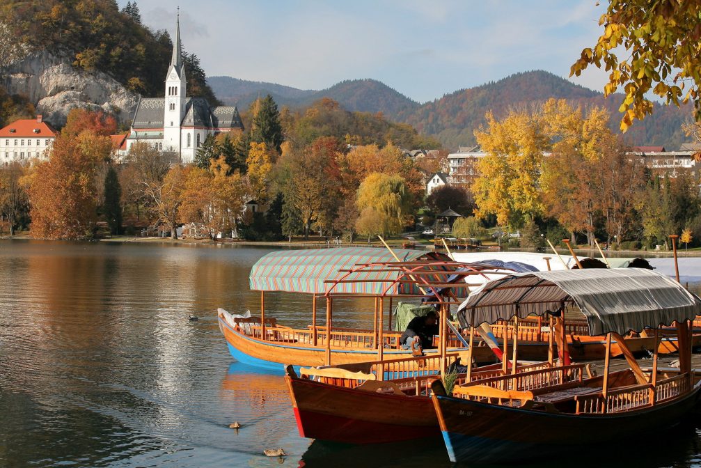 Traditional Pletna boats at Lake Bled in Slovenia in the autumn season
