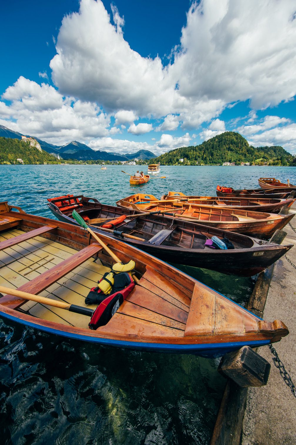 Traditional wooden rowboats at the pier on Lake Bled in Slovenia