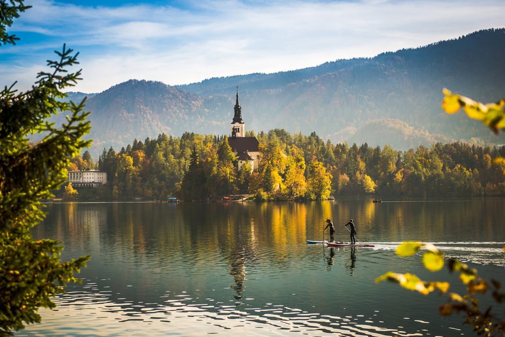 Stand up paddleboarding, or SUP, on Lake Bled in Slovenia