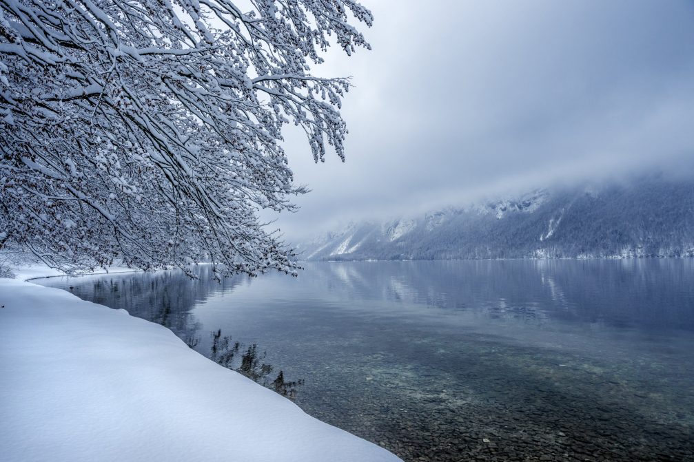 Lake Bohinj covered in snow the next day after snowfall