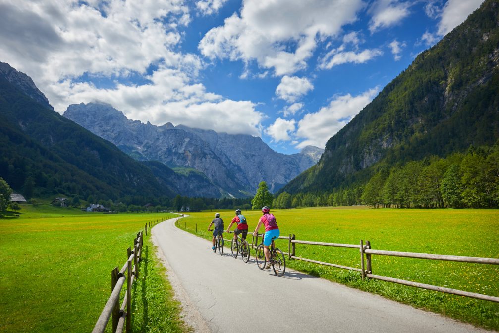 A group of people cycling in Logarska Valley in northern Slovenia