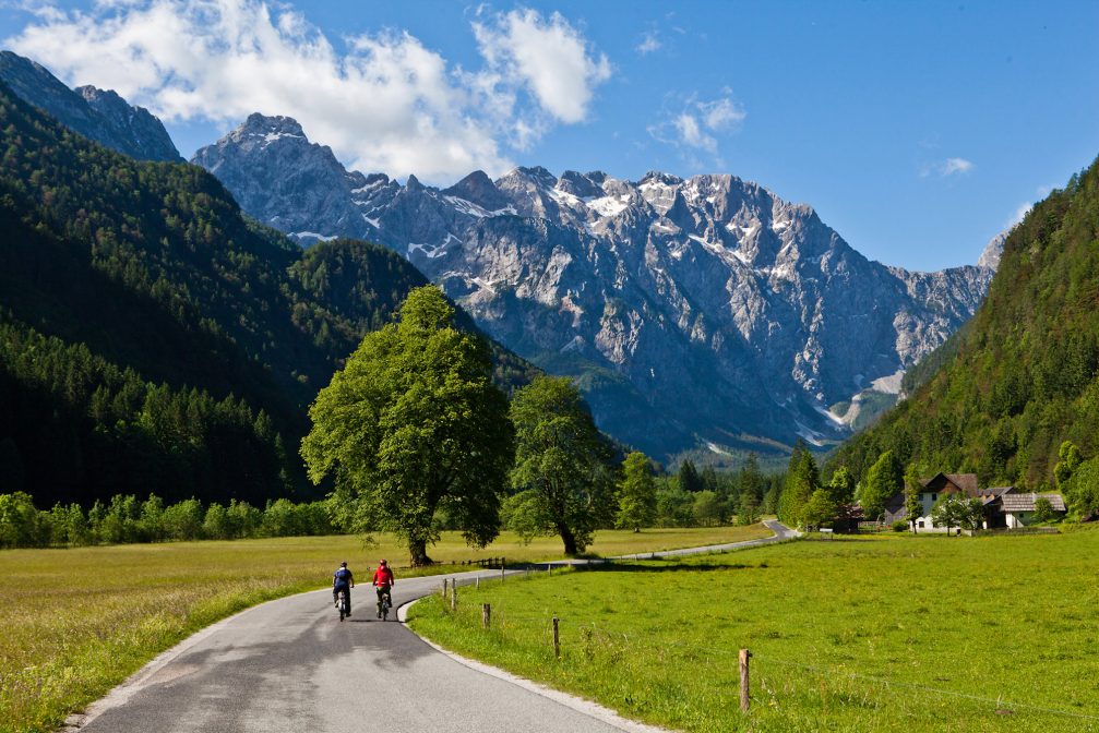 Cyclists on the road in Logarska Valley in northern Slovenia