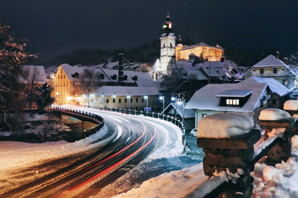 Town of Skofja Loka in Slovenia covered in snow at night