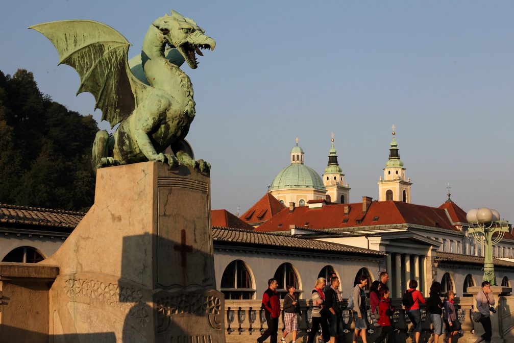 A huge statue of dragon on the Dragon Bridge in Ljubljana