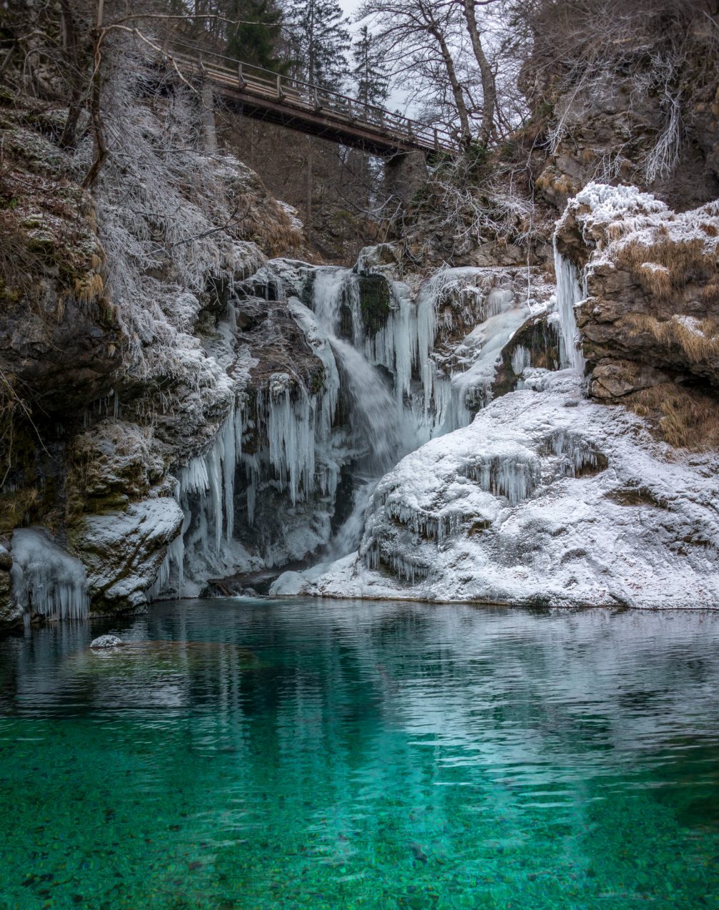 Frozen waterfall Sum at the end of Vintgar Gorge in winter