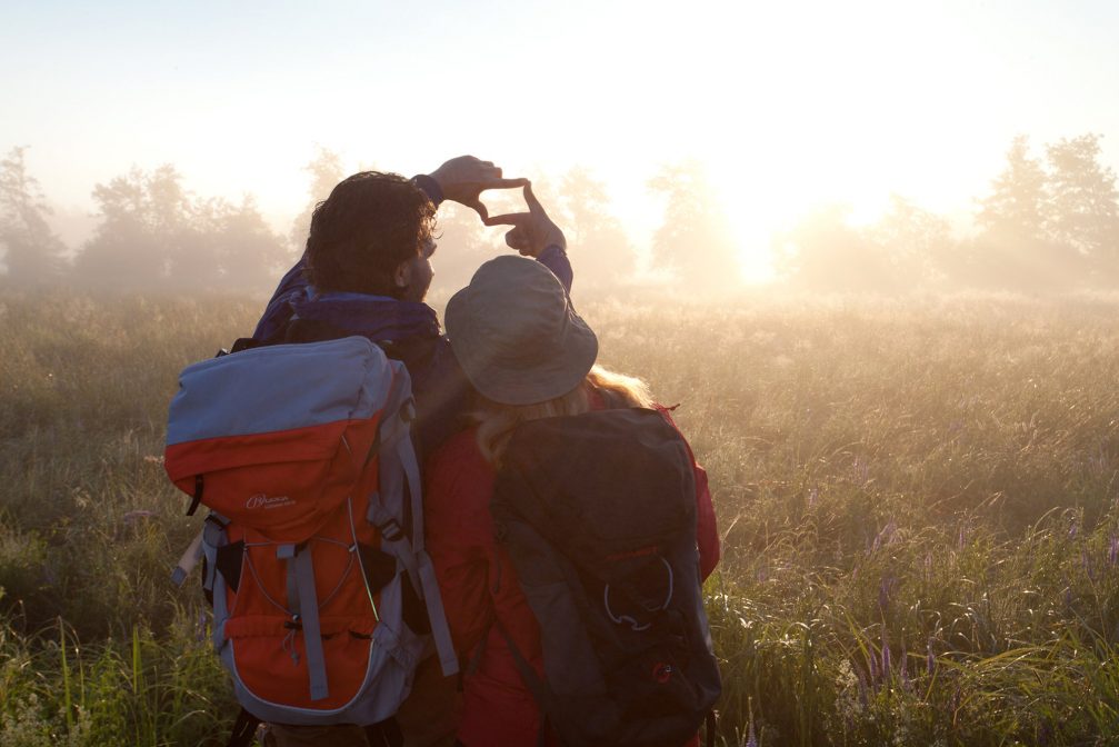 Hikers in Ljubljana Marshes Nature Park in Slovenia