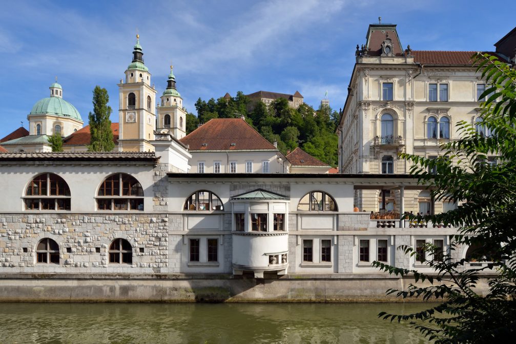 Ljubljana Central Market with the hilltop castle in the background