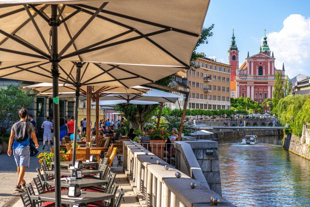 Ljubljana Old Town with outdoor cafes along the riverside