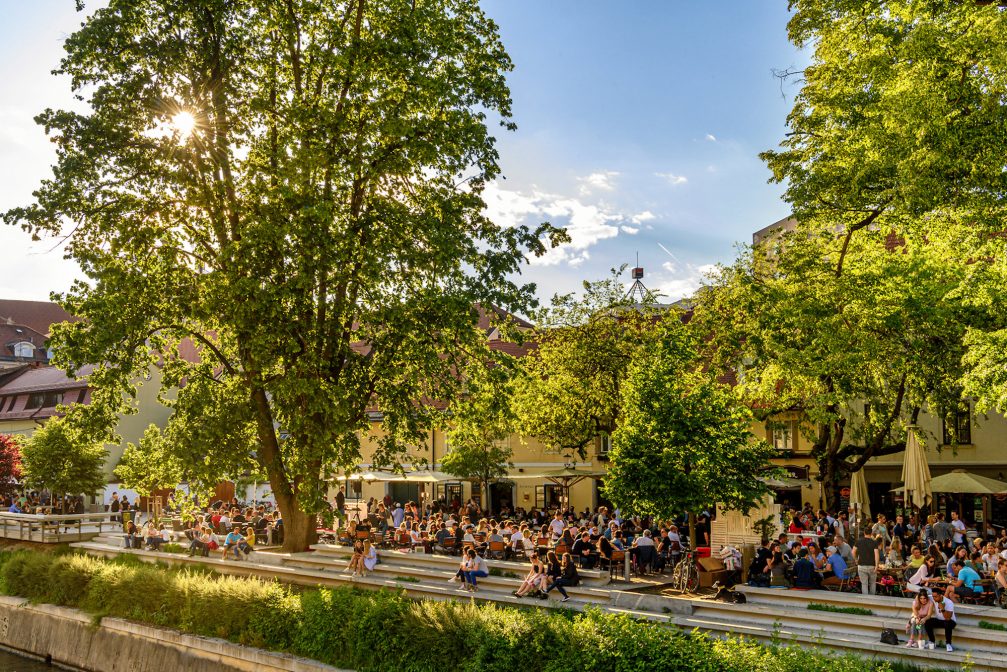 Riverside cafes in Ljubljana Old Town in Slovenia