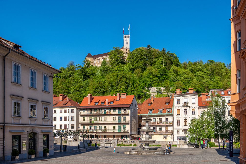 Ljubljana Old Town in summer with the hilltop Ljubljana Castle in the background