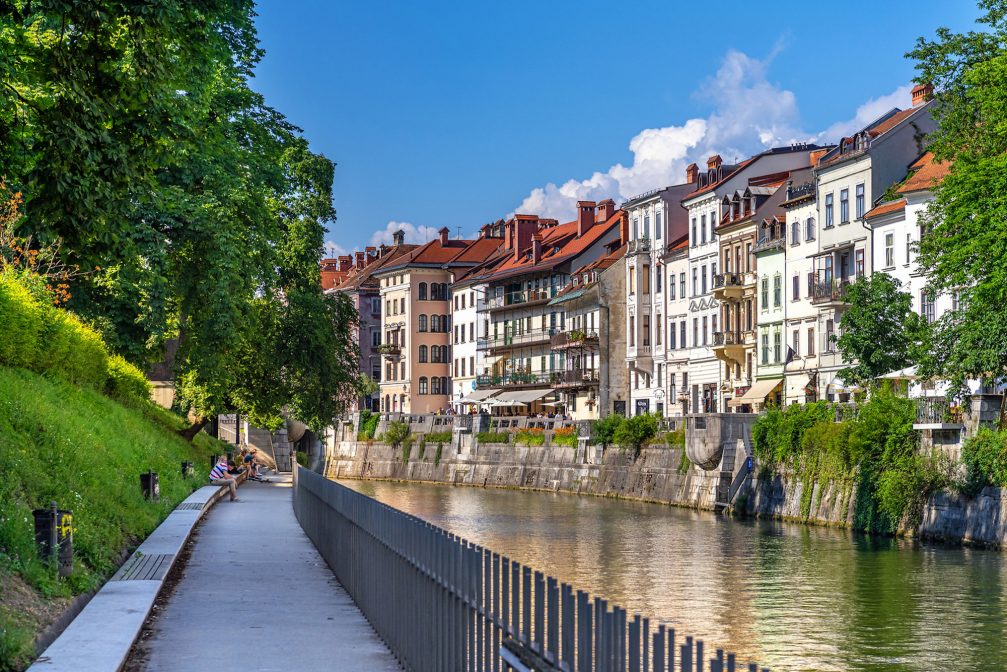 Ljubljanica River in Ljubljana with a walking path along the river