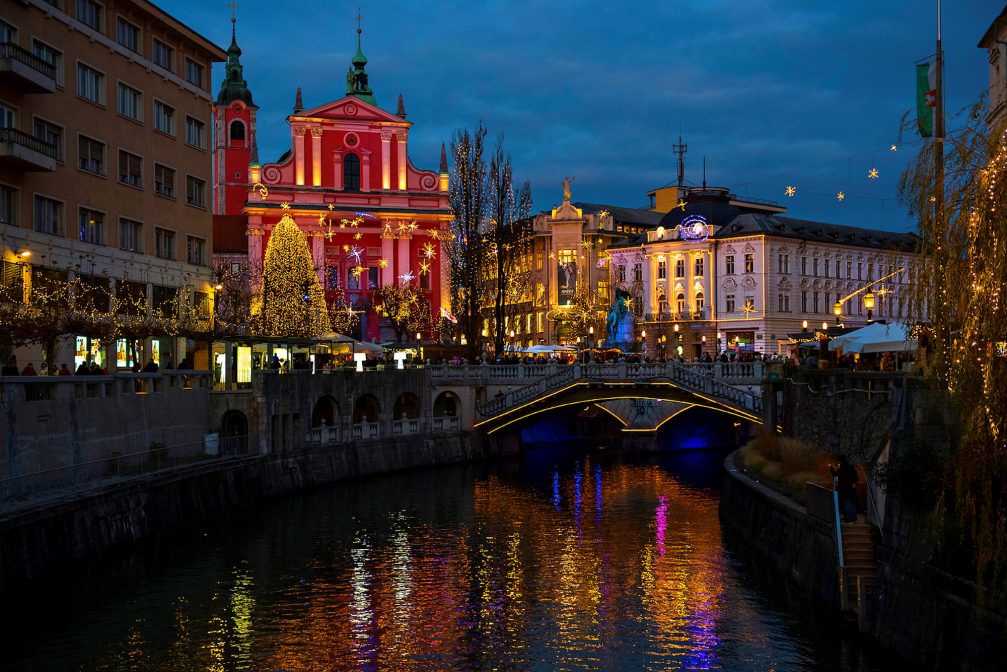 Ljubljanica River in Ljubljana Old Town decorated with Christmas lights