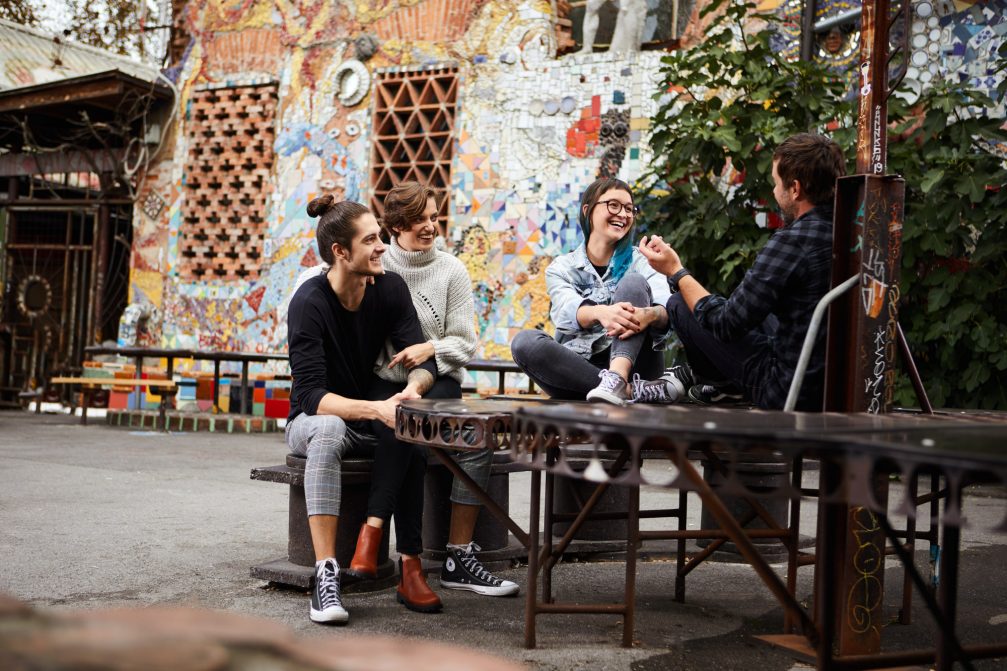 A group of artist chatting at Metelkova in Ljubljana