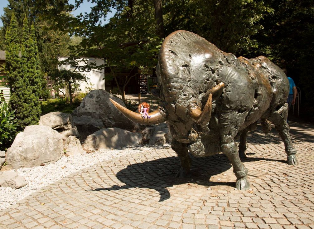 A bronze buffalo in front of the Ljubljana Zoo