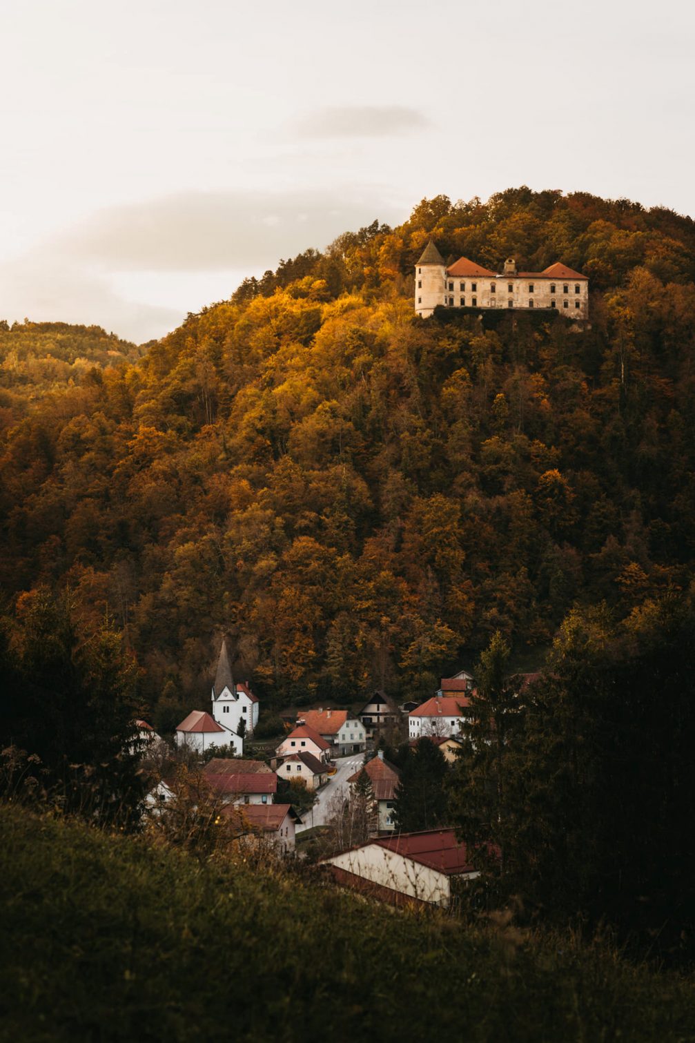 Podcetrtek in autumn with the castle on a hill in the background background