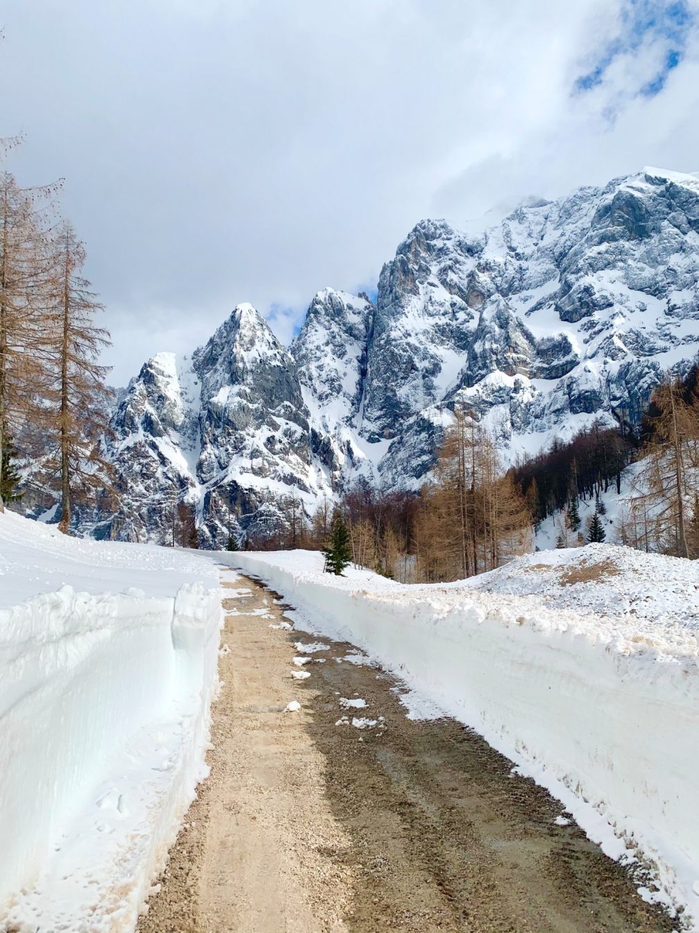 Slovenian Alps in spring with thick snow still covering the grounds