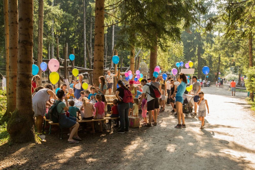 A larger group of visitors inside Ljubljana Zoo