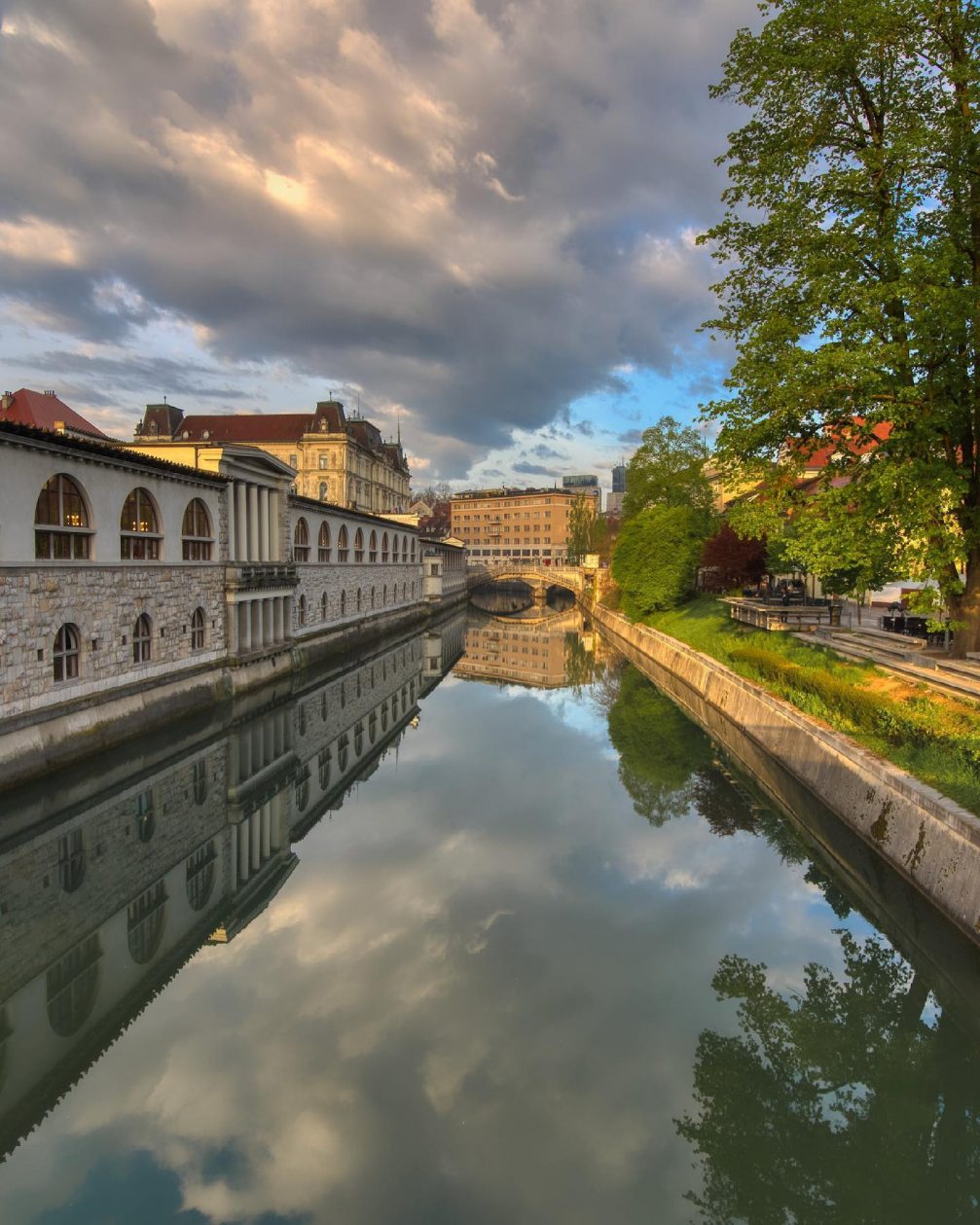 River Ljubljanica flowing by Ljubljana Central Market in spring