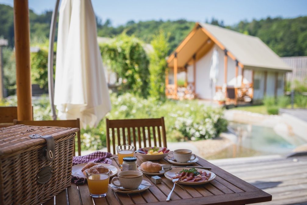 A breakfast on the table at Glamping Olimia Adria Village accommodation at Terme Olimia in Podcetrtek  