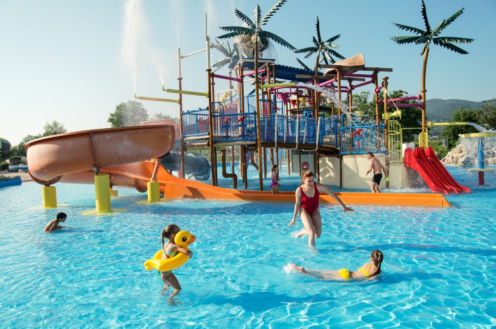 A group of children in pools of Summer Thermal Riviera at Terme Catez Bath Complex in Slovenia