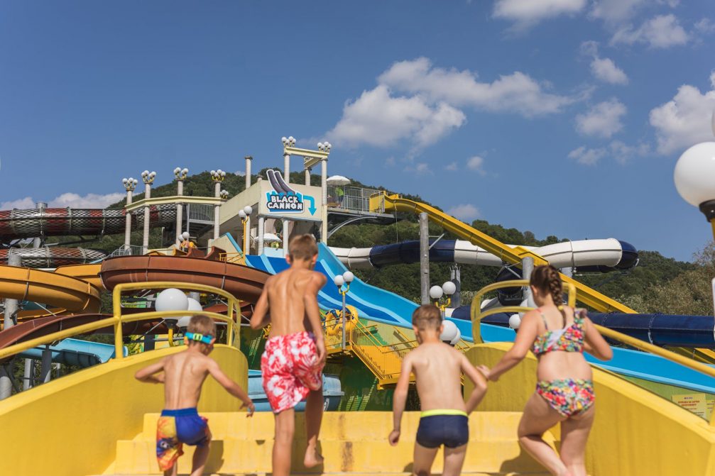 A group of kids on children water slides in Thermal Park Aqualuna at Terme Olimia