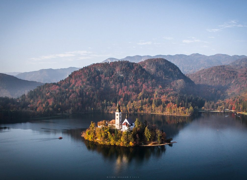 Drone photo of Church on Bled Island in Slovenia in the fall season