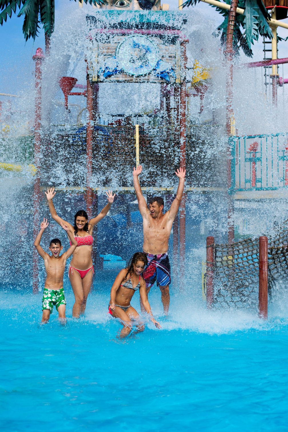 A family at Summer Thermal Riviera pools at Terme Catez Bath Complex and Spa in Slovenia