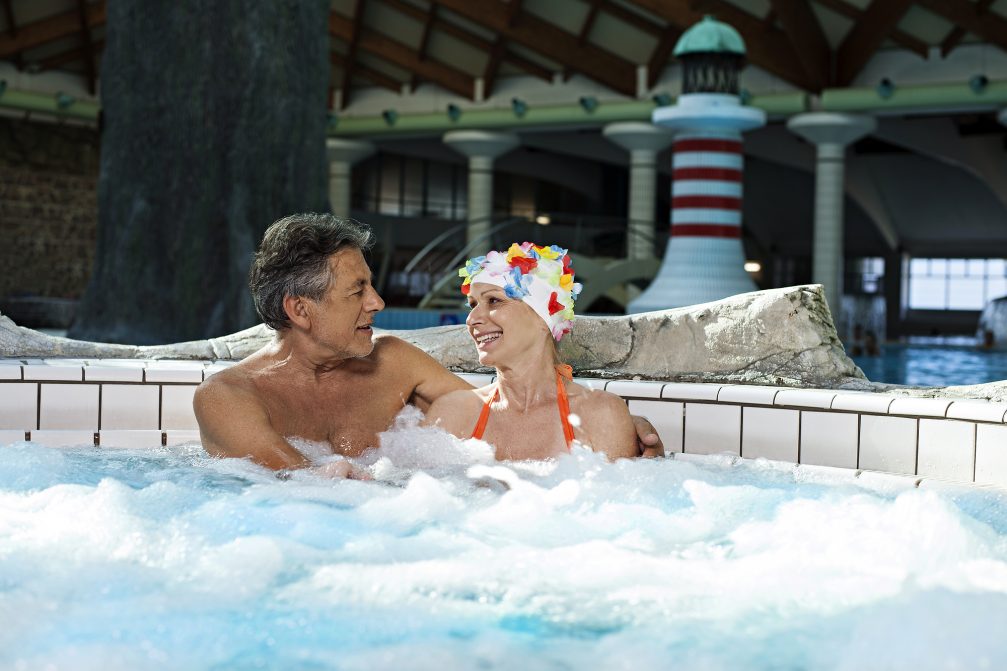 An older couple in a spa whirlpool at Terme Catez Spa in Slovenia