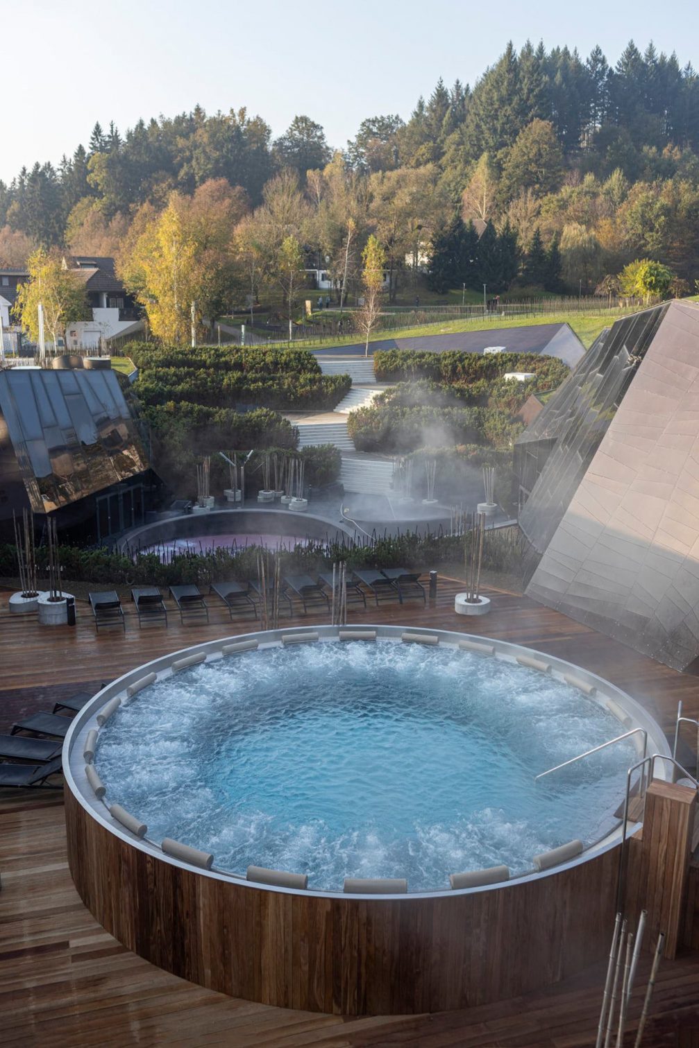 Outdoor jacuzzi at Wellness Orhidelia inside Terme Olimia Thermal Spa in Podcetrtek