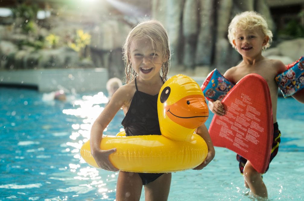 A group of kids in family friendly thermal pools at Terme Catez Bath Complex in Slovenia