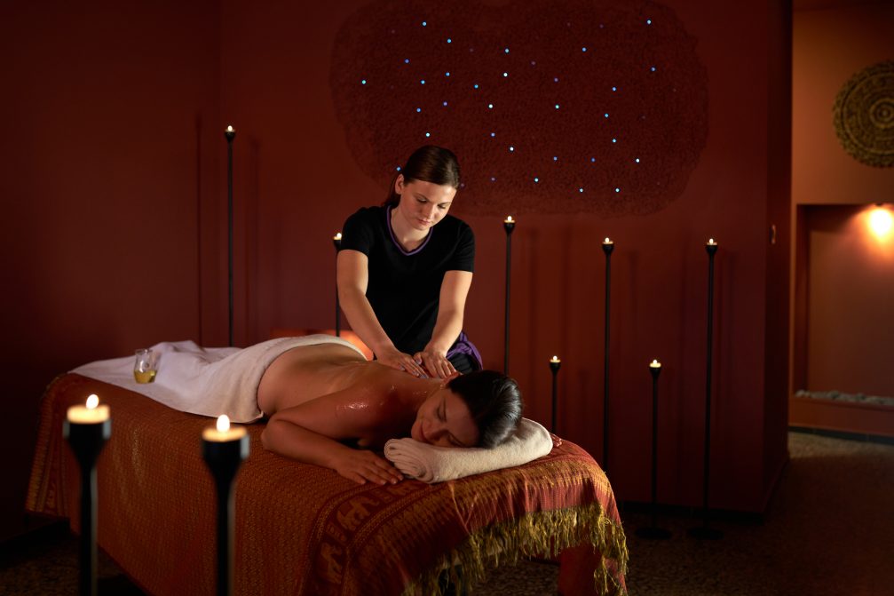 A man getting a massage at Terme Olimia Thermal Bath Complex in Podcetrtek