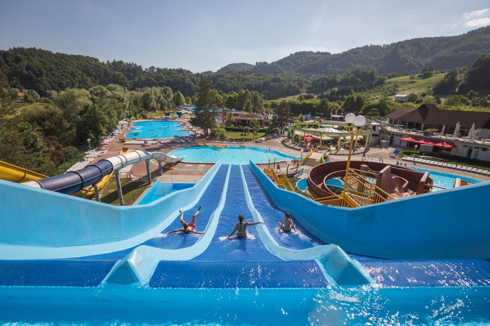 View of blue water slides in Thermal Park Aqualuna at Terme Olimia