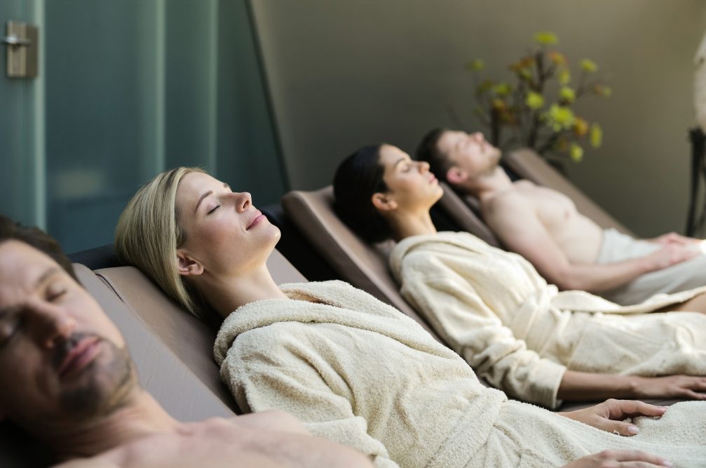 A group of visitors relaxing at Terme Olimia Thermal Bath Complex in Podcetrtek