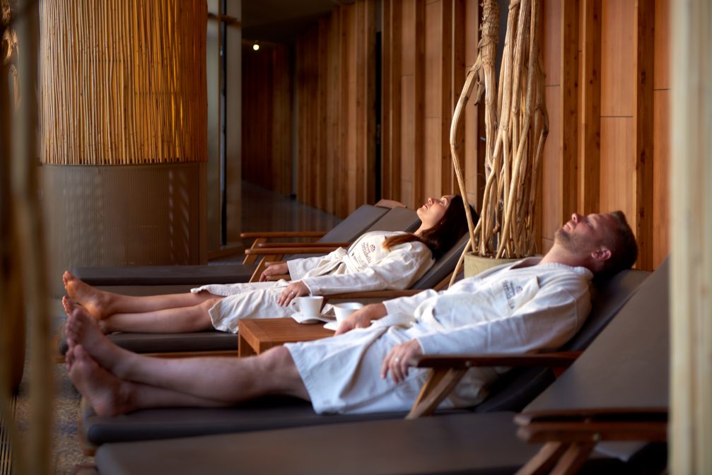 A group of visitors relaxing at Terme Olimia Thermal Bath Complex in Podcetrtek