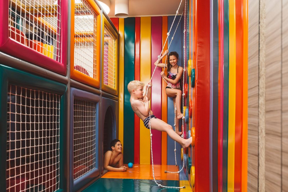 A group of kids on the climbing wall at Family Wellness Termalija in Terme Olimia in Podcetrtek 