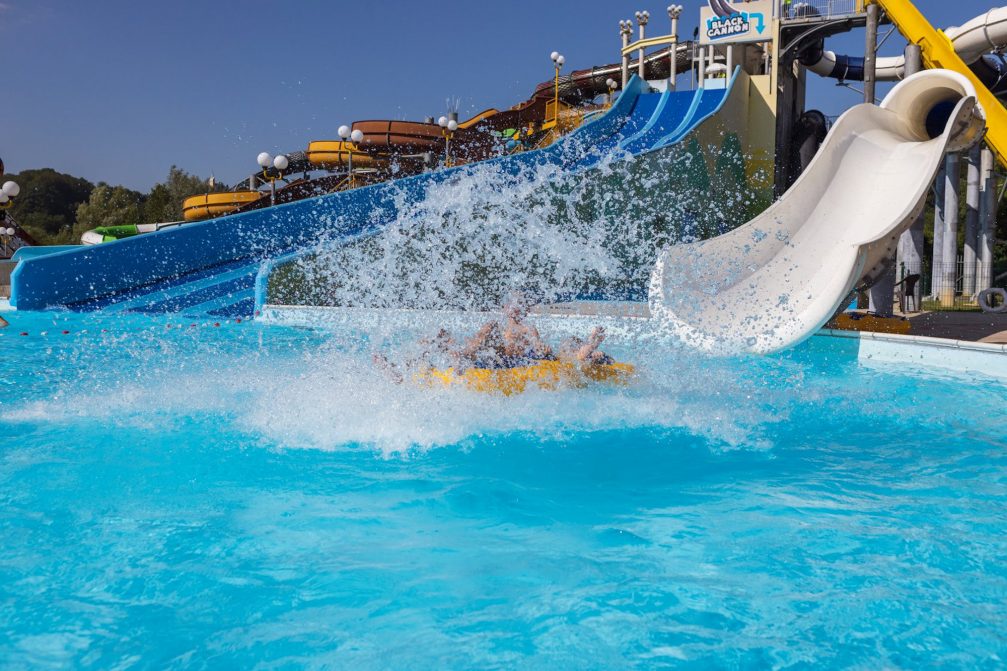 A number of different water slides in Thermal Park Aqualuna at Terme Olimia in summer