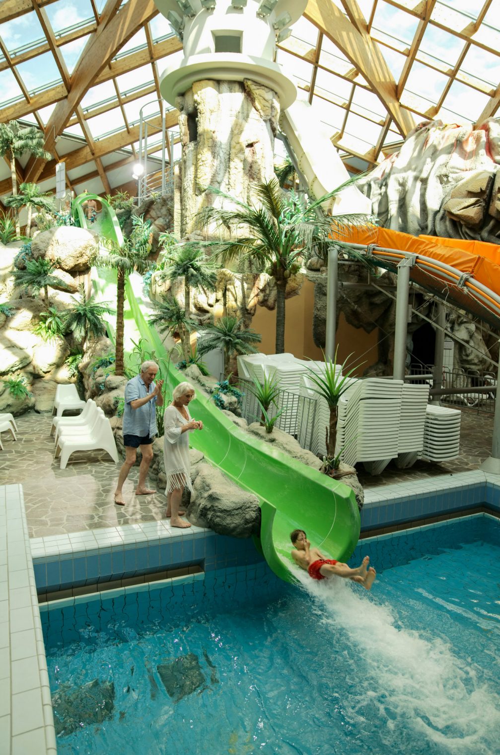 A green water slide of Winter Thermal Riviera at Terme Catez thermal spa in Slovenia 